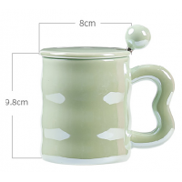 Pearly lustre ceramic mug with a lid