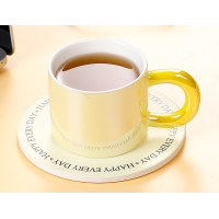 Pearly lustre ceramic coffee cup with a lid